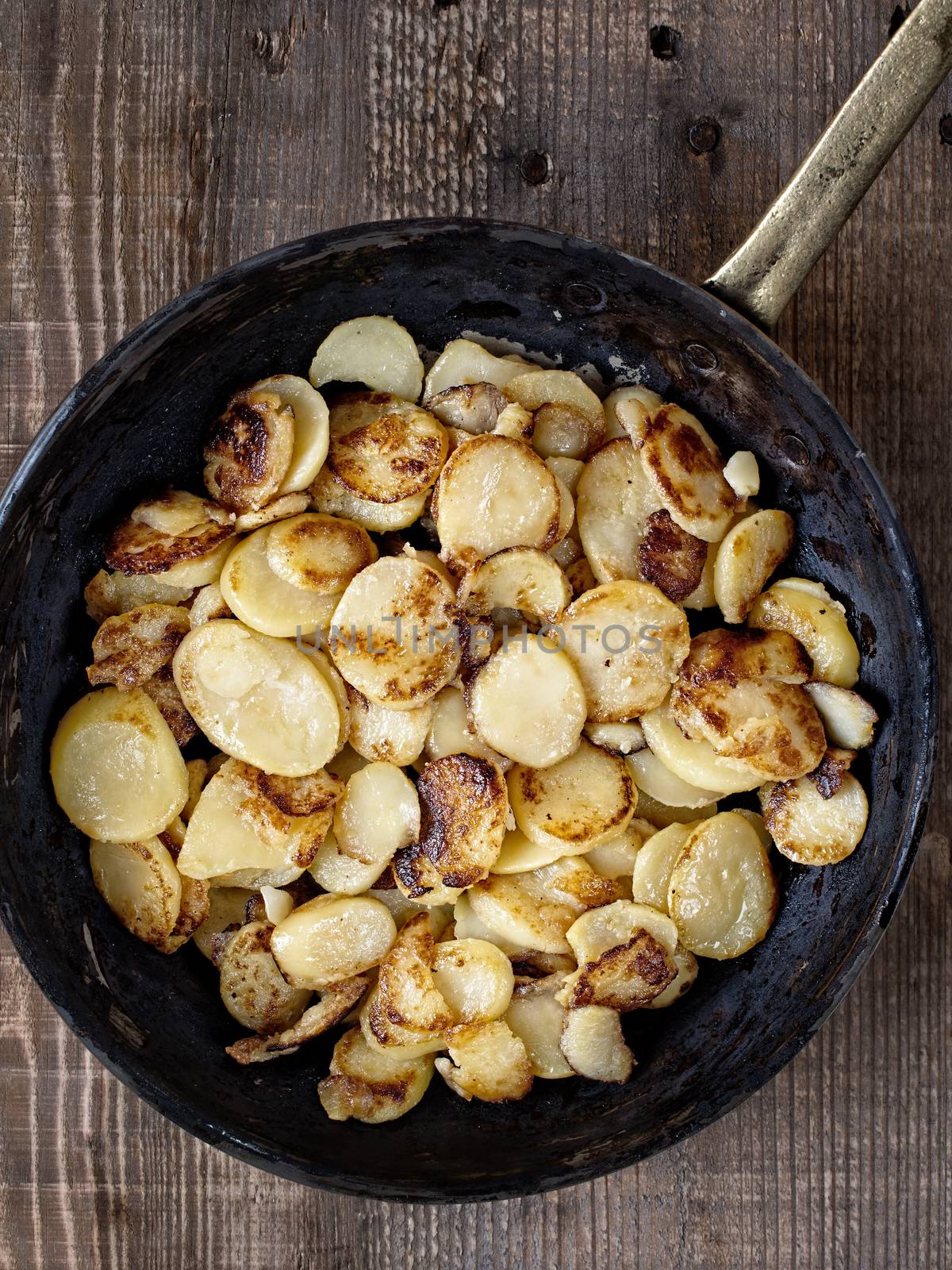 close up of rustic german bratkartofflen fried potatoes