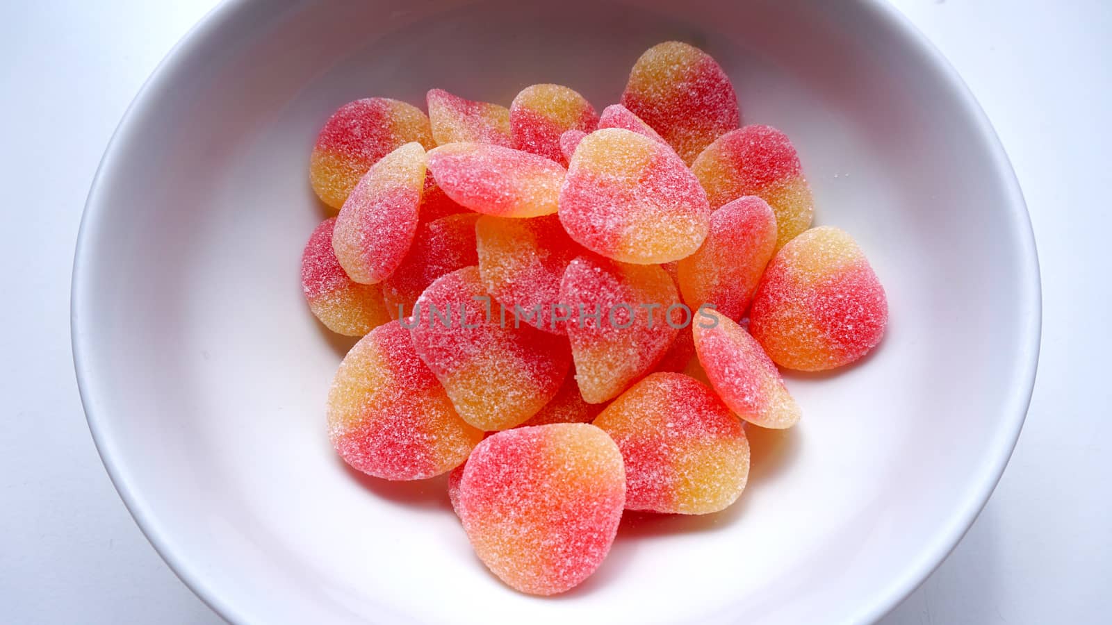 jelly with sugar in the white bowl on white background