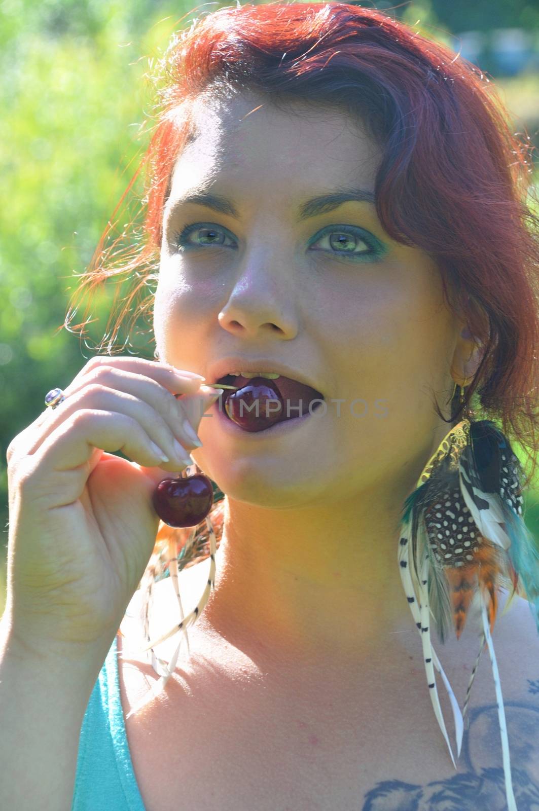 Woman eating cherries