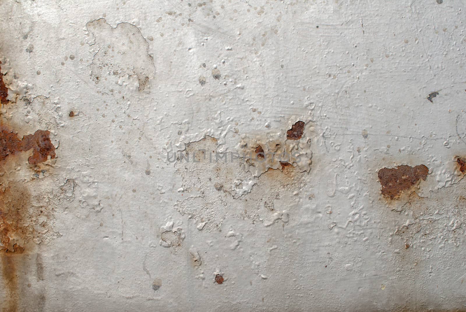 chipped paint on iron surface, grunge metal surface, great background or texture for your project by uvisni