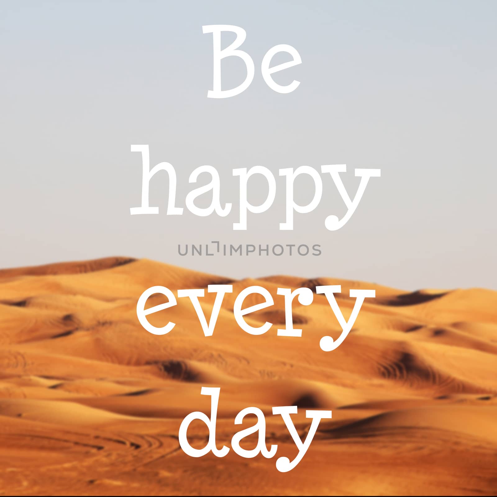 Blured desert with text: Be happy every day by Voinakh
