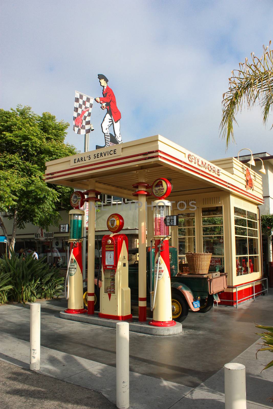 Los Angeles, CA, United States - 14 June 2010. The exhibit - a petrol station in retro style. Displaying looked like a gas station in the 1920s. At the gas station and parked retro car