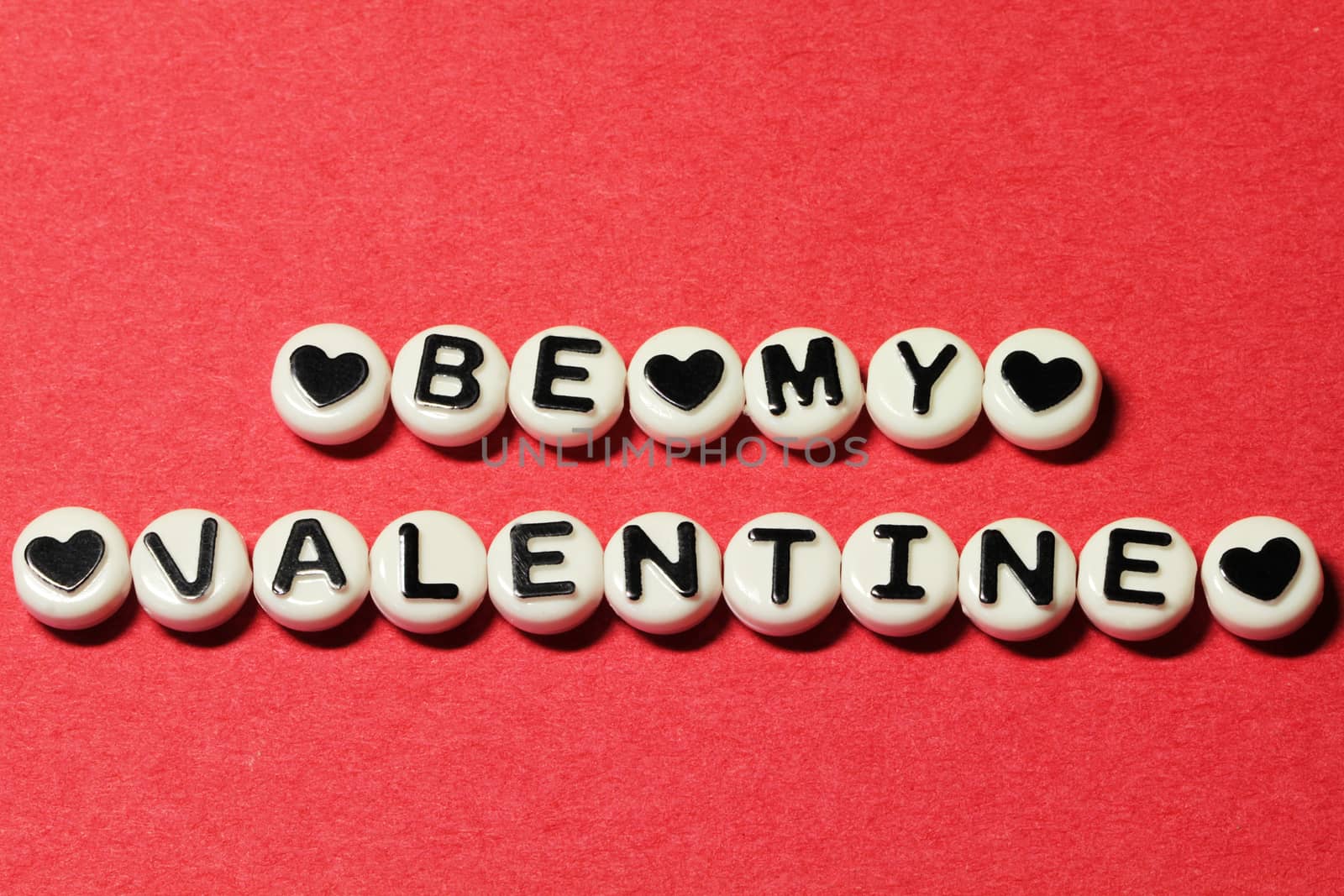Be my valentine on red background
