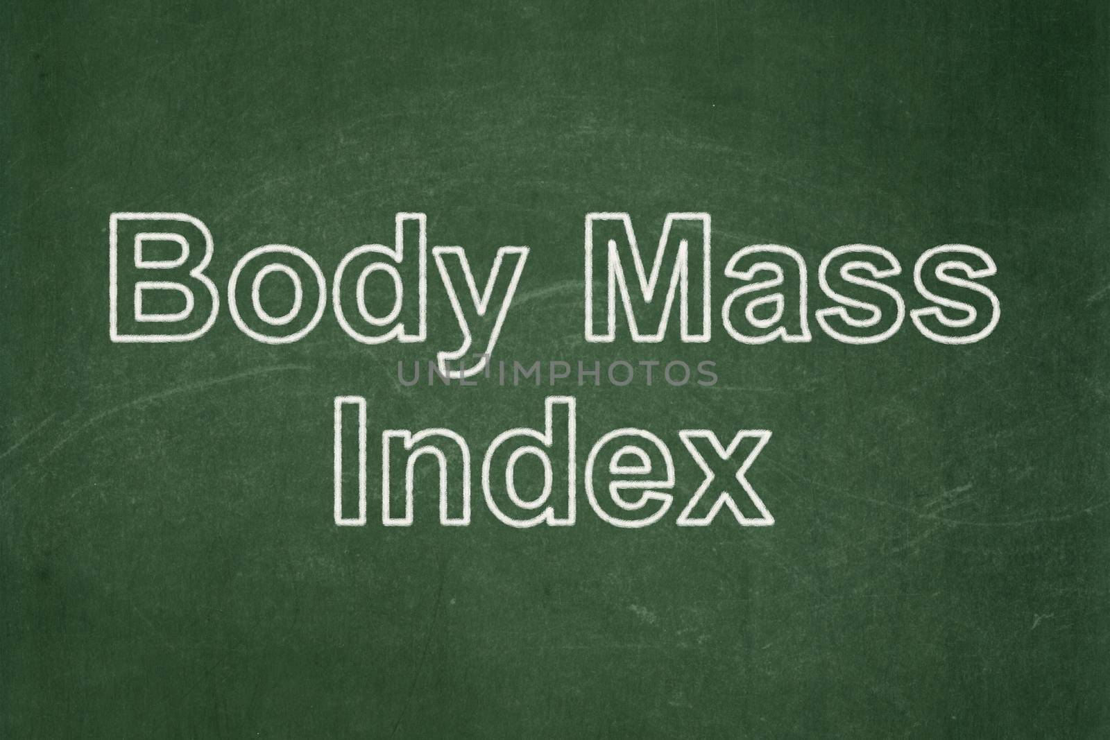 Medicine concept: text Body Mass Index on Green chalkboard background