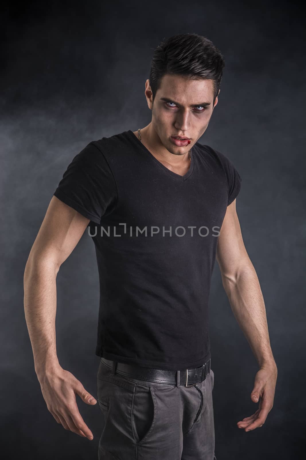 Portrait of a Young Vampire Man with Black T-Shirt by artofphoto