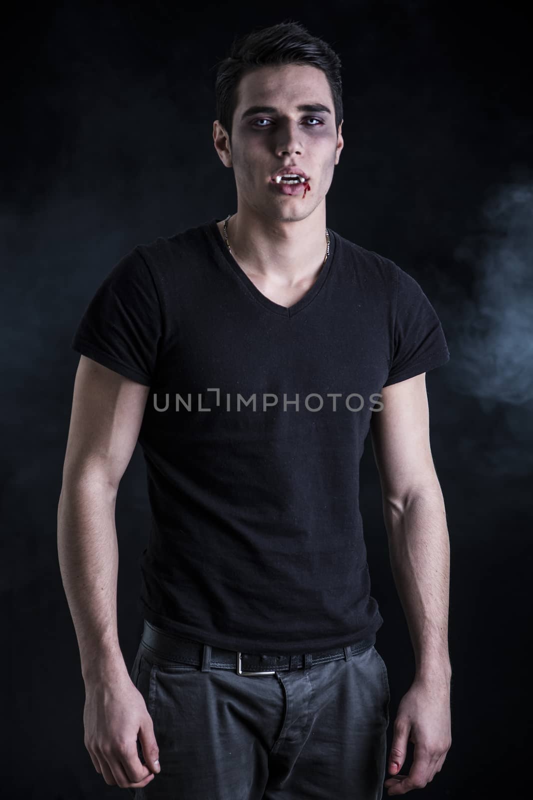 Portrait of a Young Vampire Man with Black T-Shirt by artofphoto