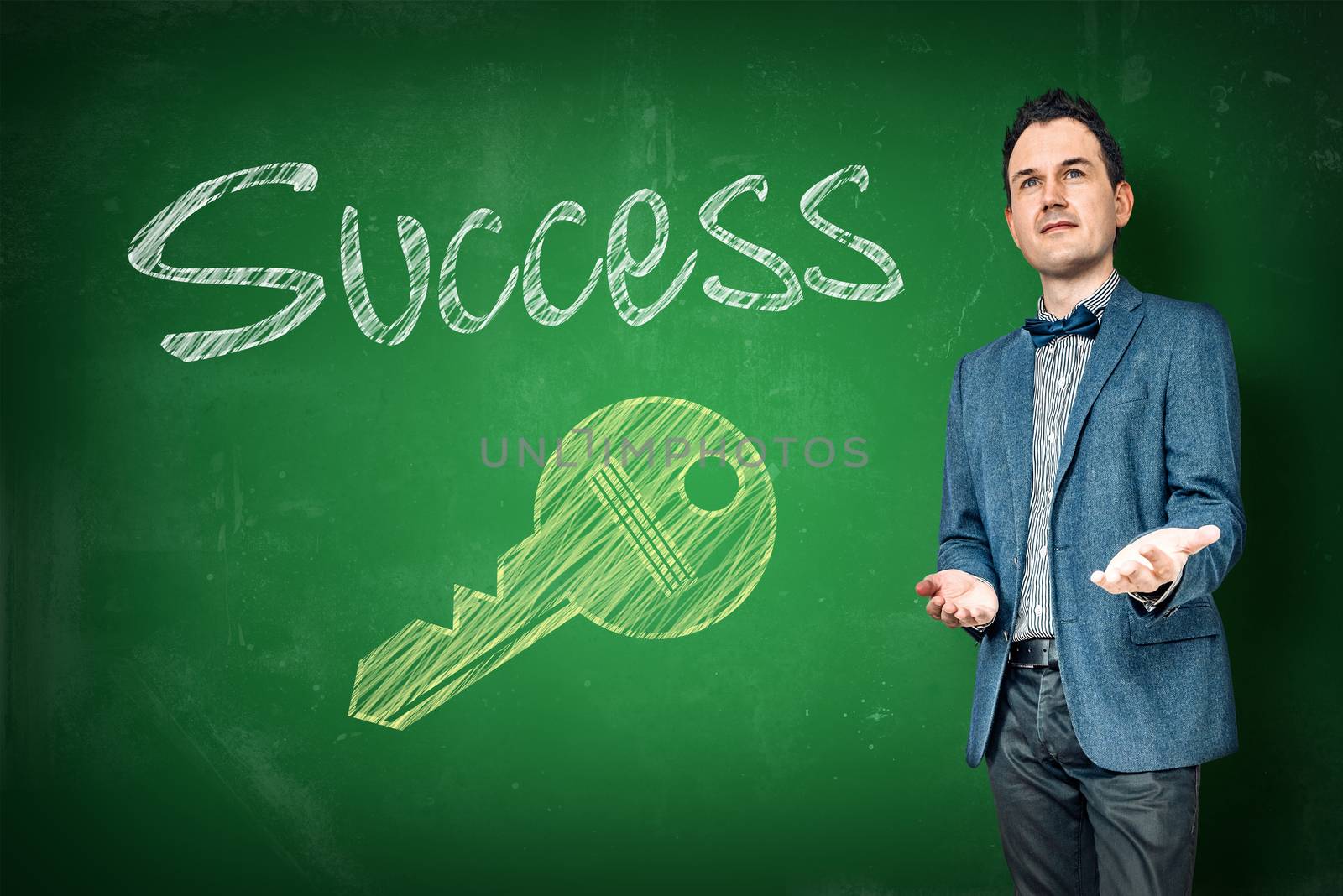 Success coaching with a key on a chalkboard