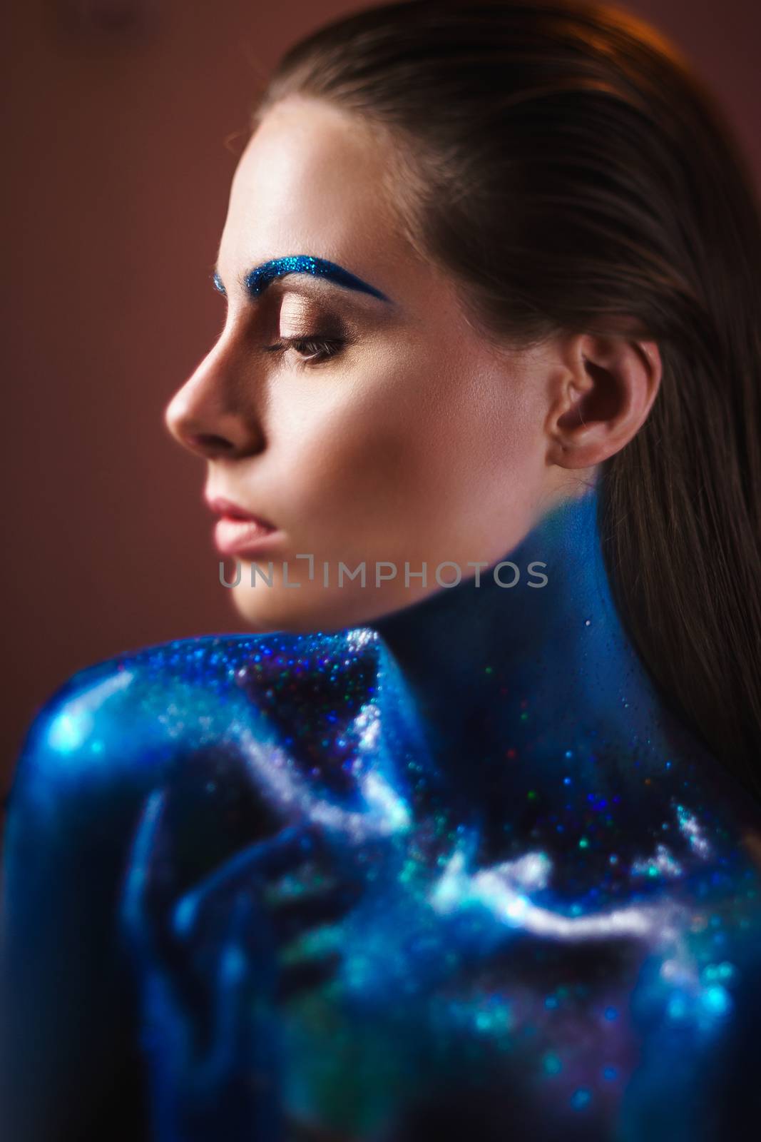 Portrait of beautiful woman painted with cosmic colors and spangled. by mrakor