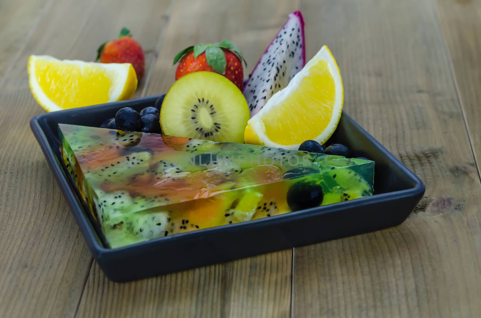 Mixed jelly fruits ( strawberry, blueberry, kiwi, orange, dragon fruit )