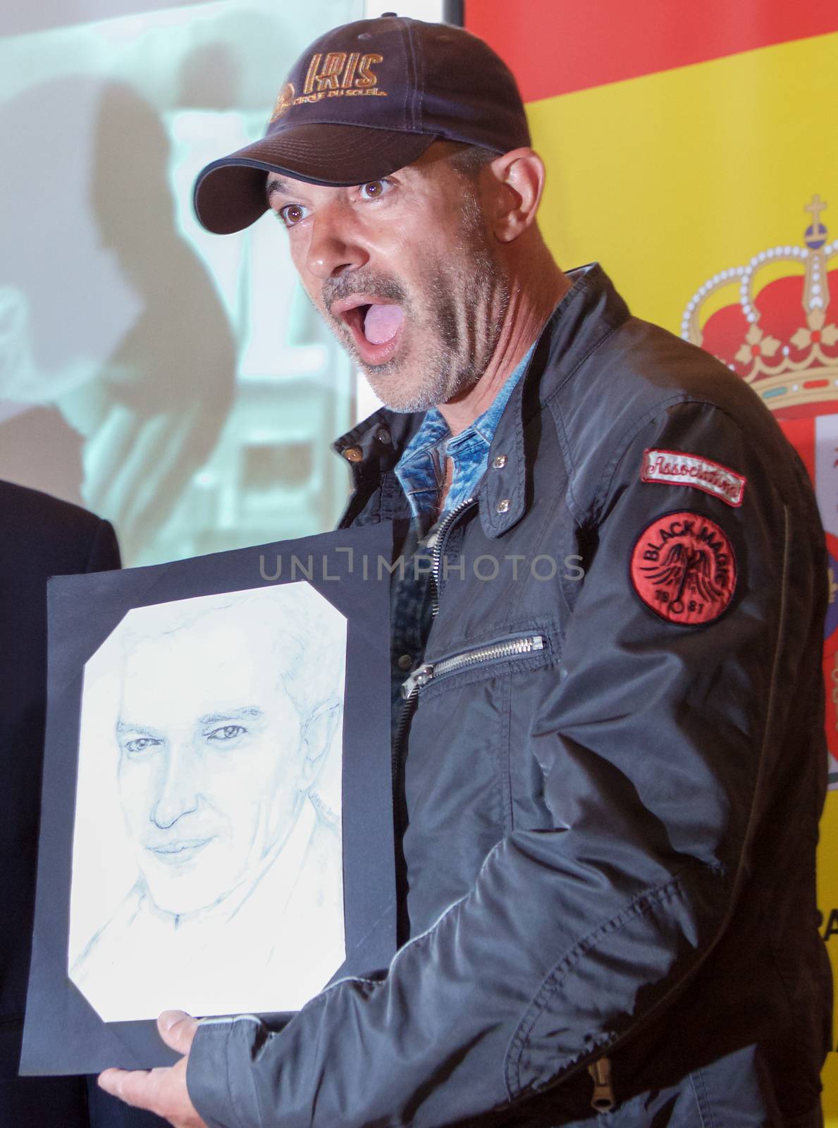 Sofia, Bulgaria - June 11, 2013: Antonio Banderas is reacting when given a drawing from a fan at Mati hall press conference during the 20th Film Festival of the hispanic and hibero hispanic movies in Sofia, Bulgaria.