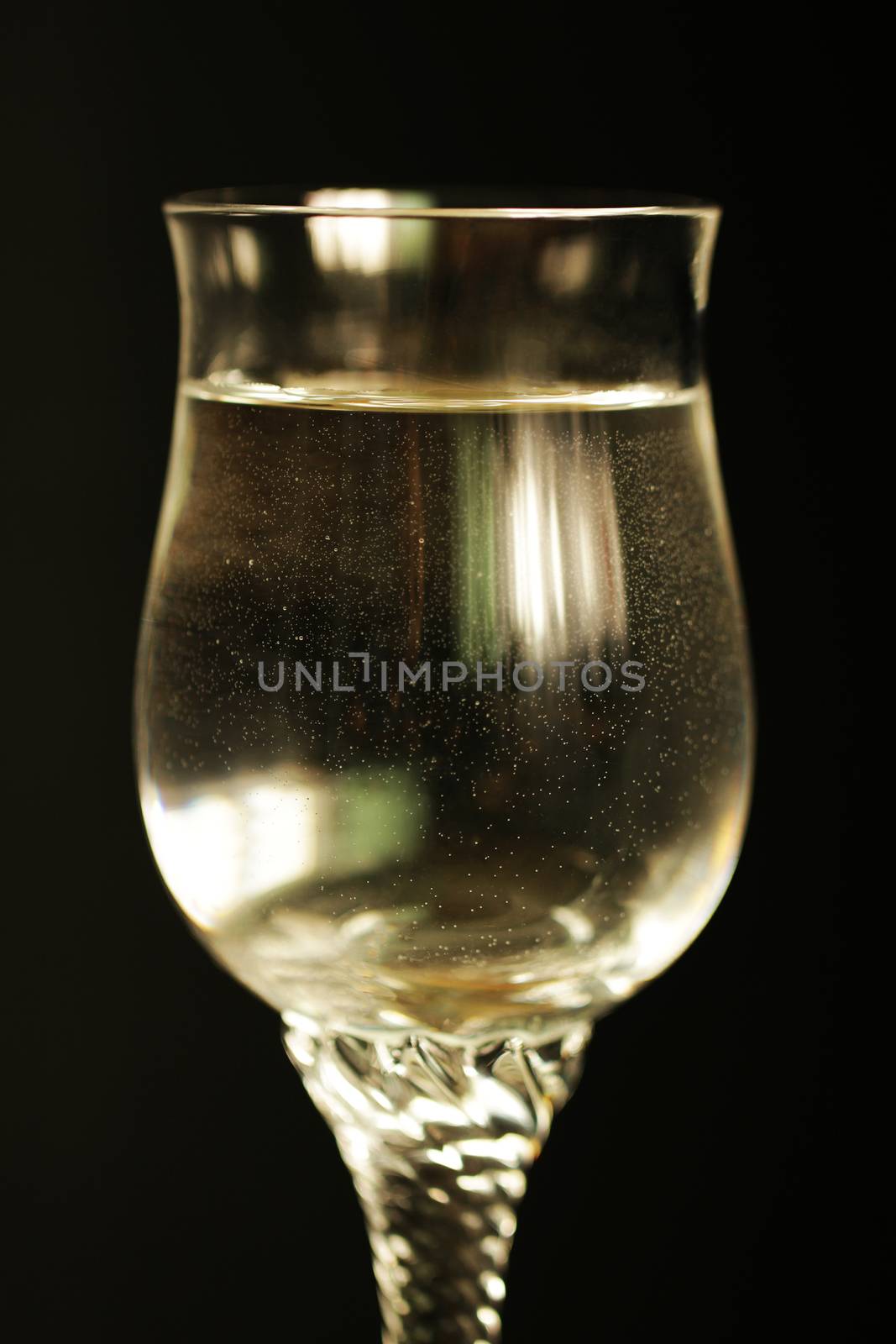 Sparkling water like champagne in a glass by Voinakh