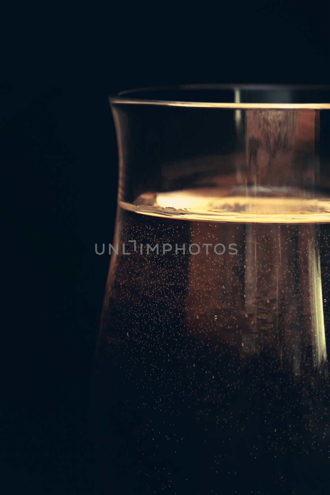 Sparkling water like champagne in a glass by Voinakh