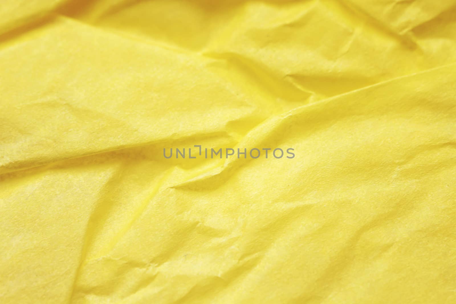 Creased recycled paper. beautiful light yellow background