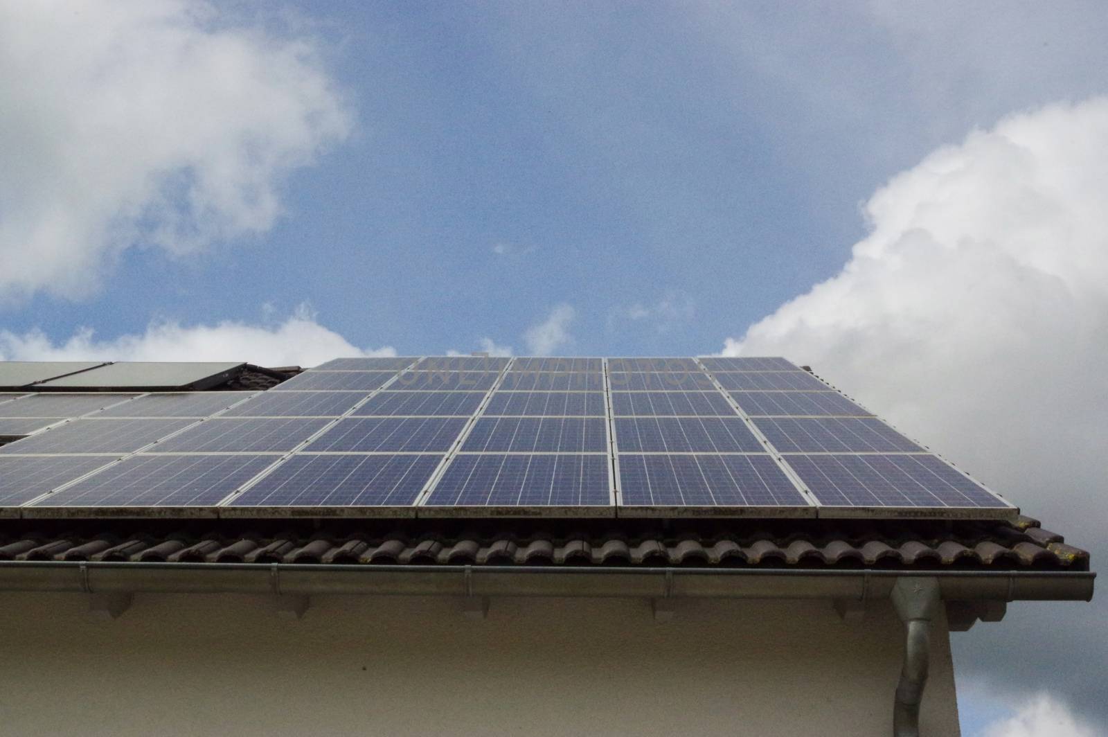 a Roof with solar photovoltaic panels photovoltaic