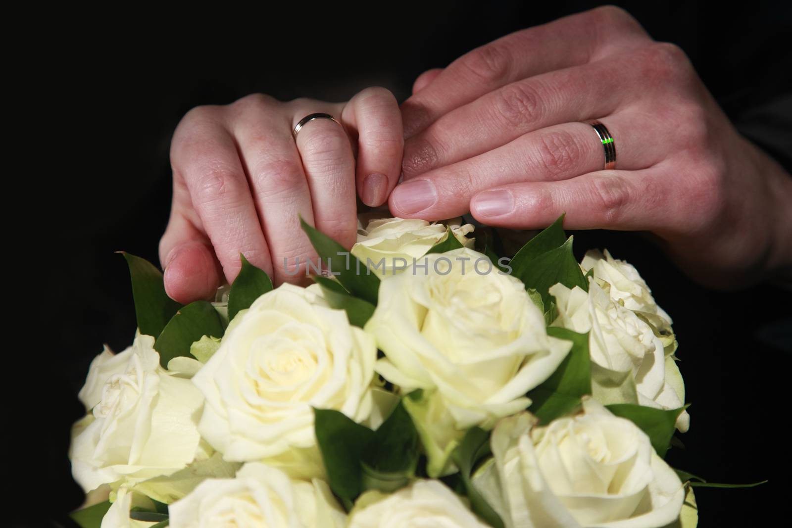 The groom keep the bride for hands