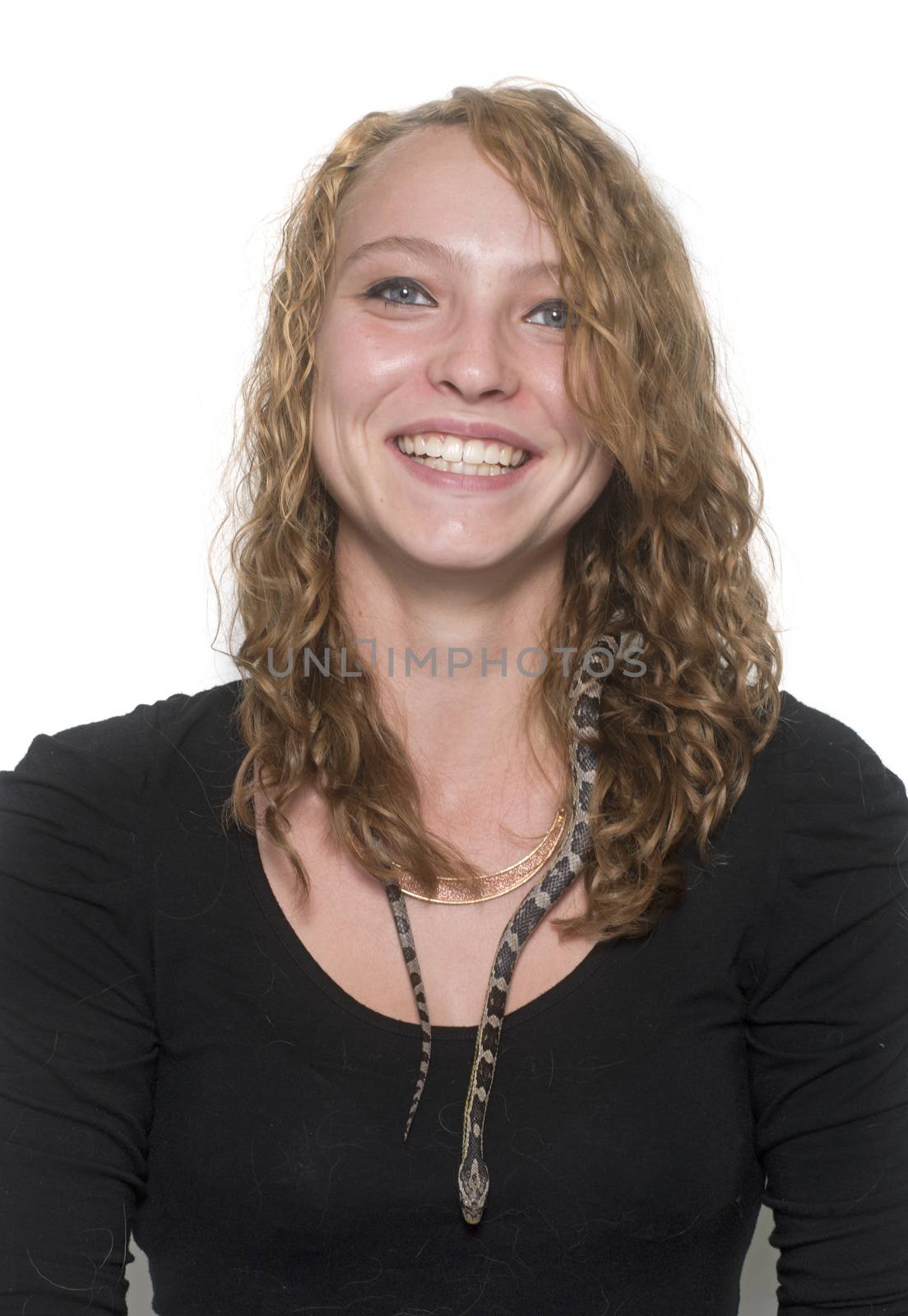 corn snake and girl in front of white background