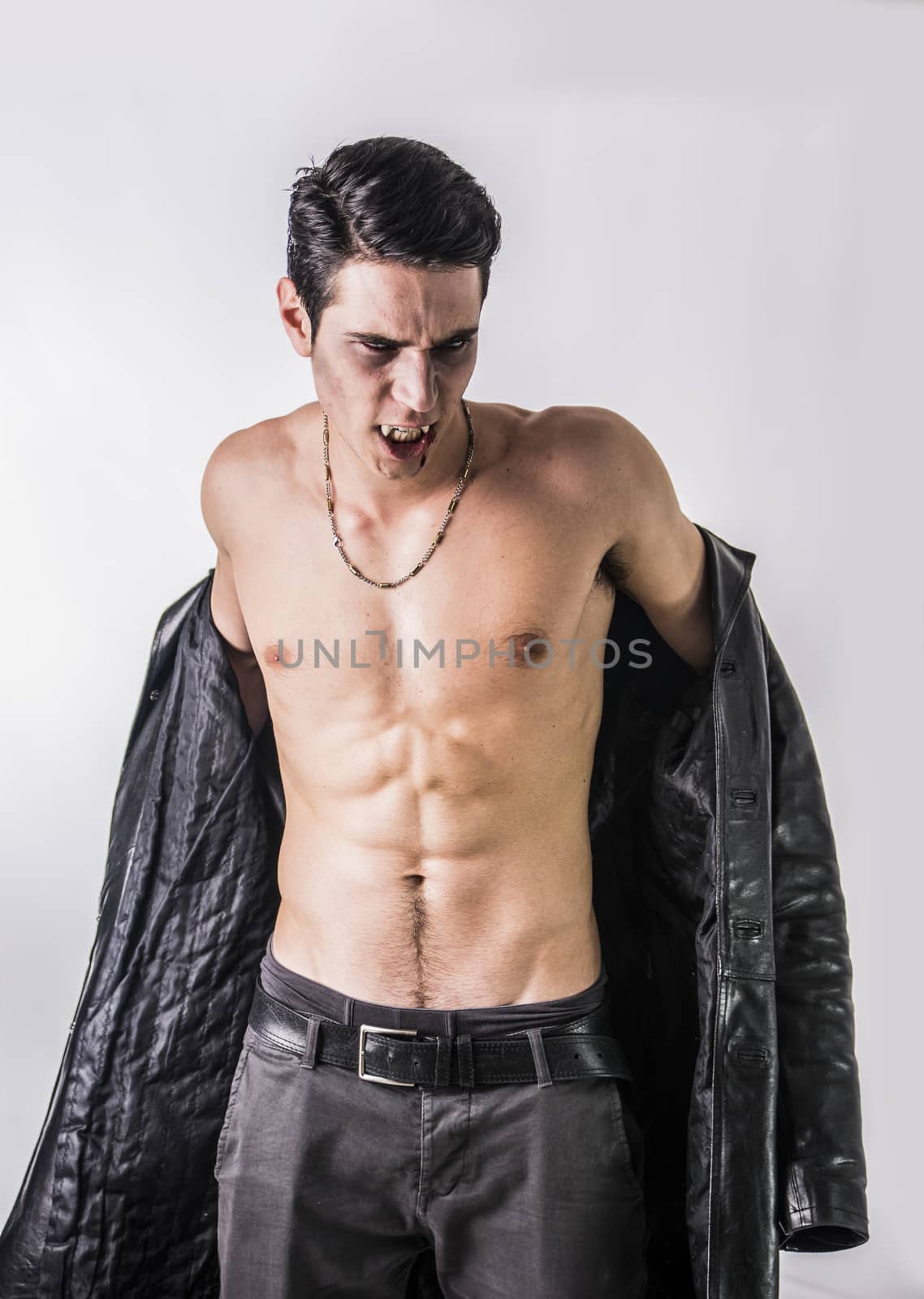 Young Vampire Man in an Open Black Leather Jacket by artofphoto