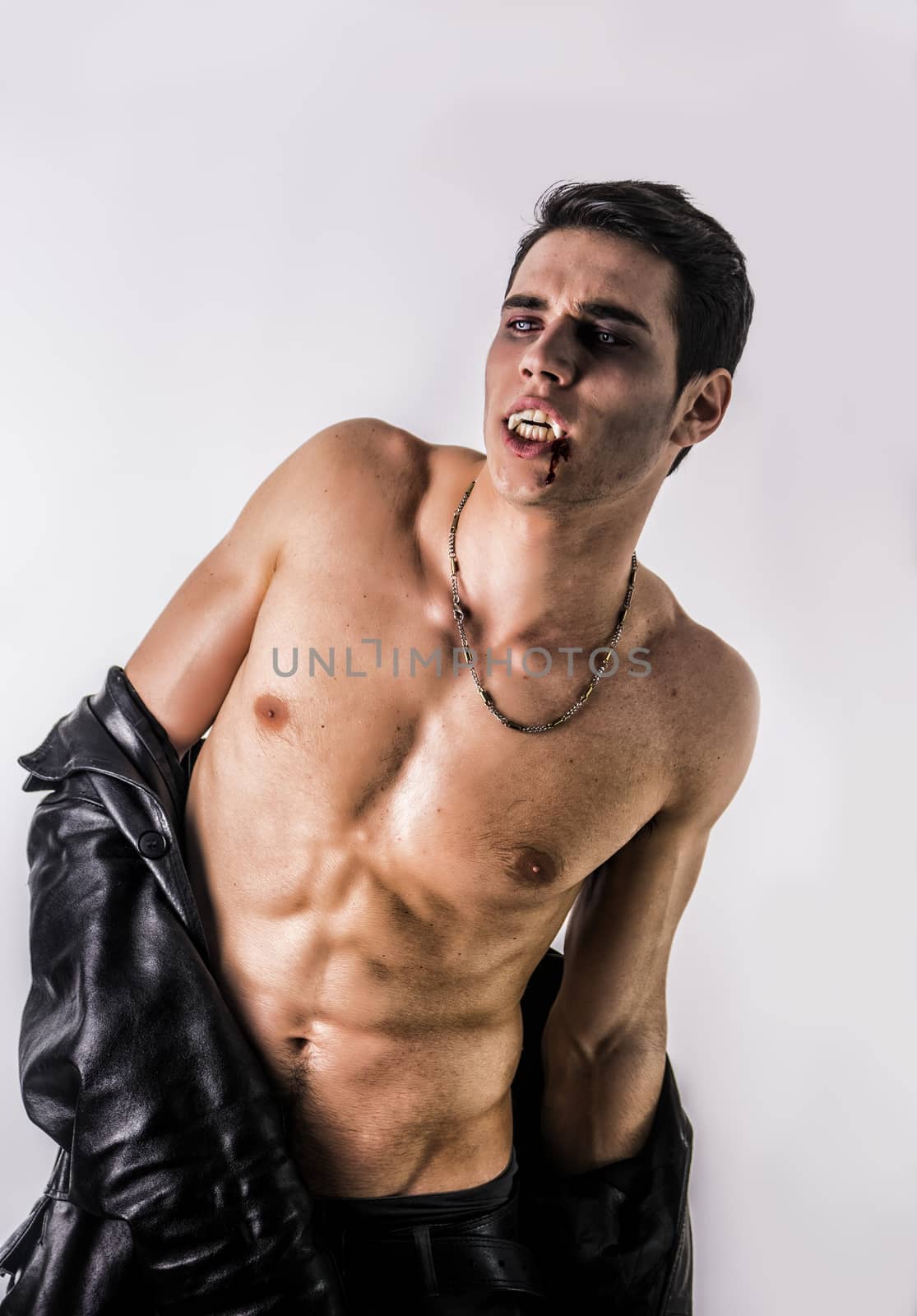 Young Vampire Man in an Open Black Leather Jacket by artofphoto