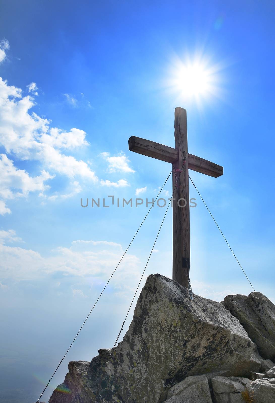 Wooden cross on top of the Predne Solisko peak in High Tatras mountain.