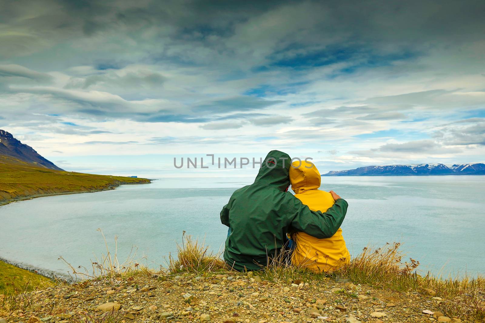 A couple contemplating the beautiful landscape