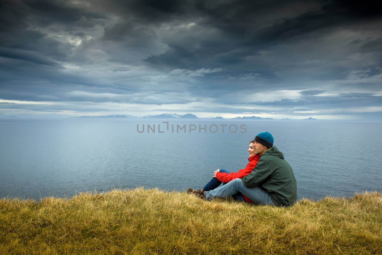 A couple contemplating the beautiful landscape