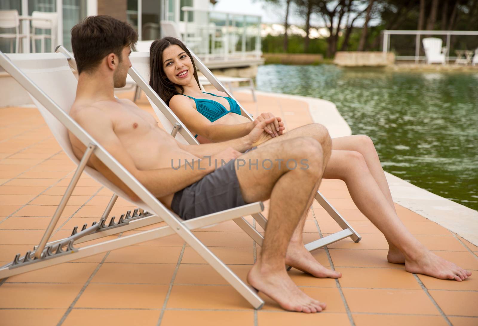 Young couple enjoying vacations in a hotel