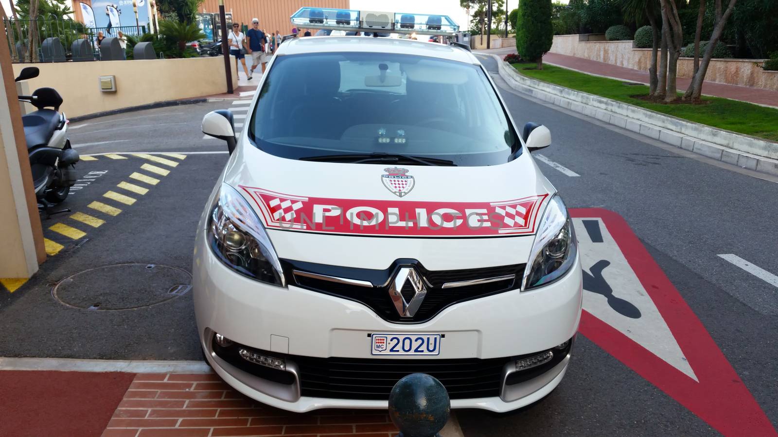 Fontvieille, Monaco - September 29, 2016: Renault Scenic III TCe Police Car (Front View), Car of Monaco Police Patrol on the City Street of Fontvieille In Monaco, French Riviera