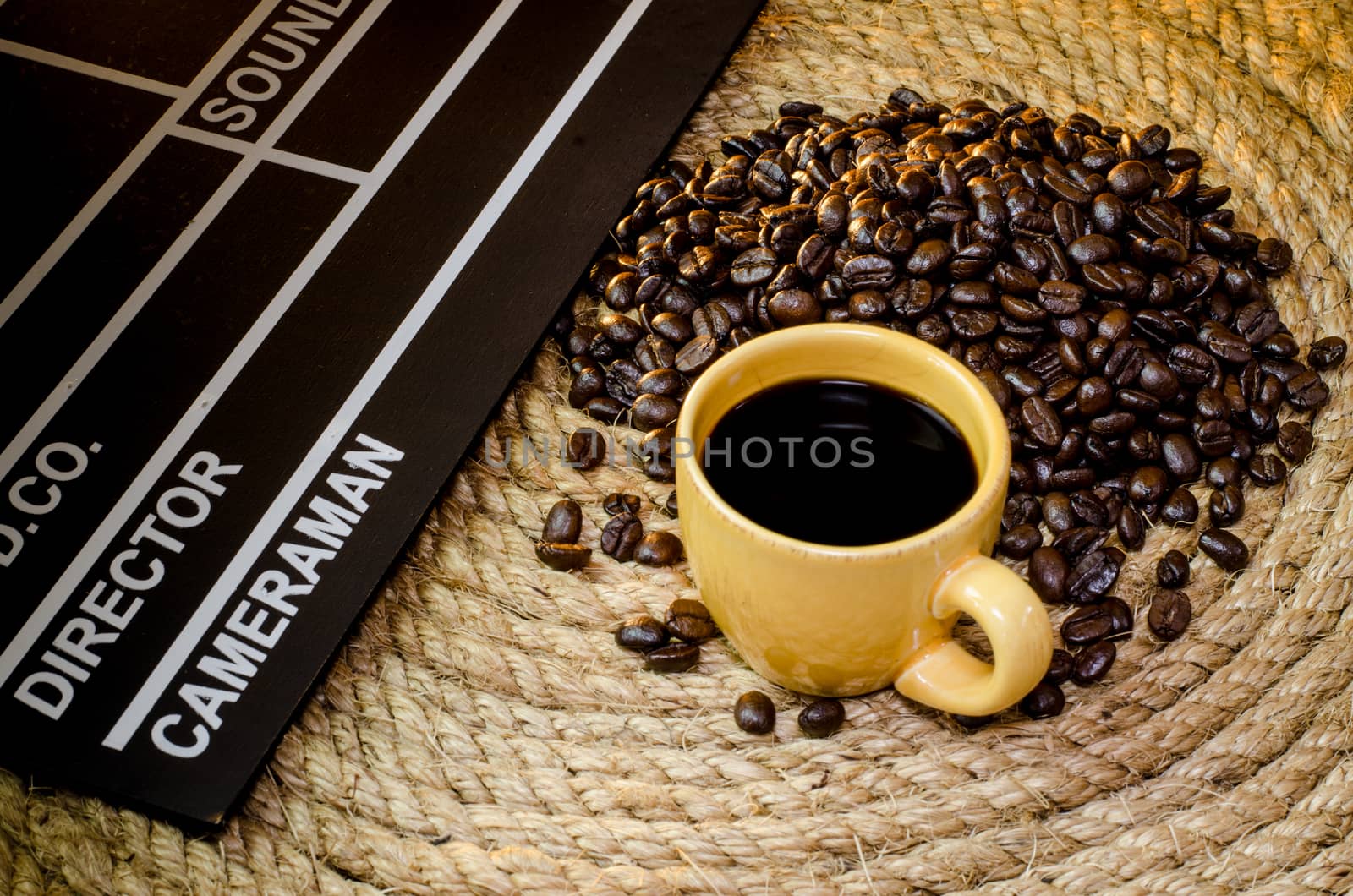 Cup of coffee with slate on a jute rope.