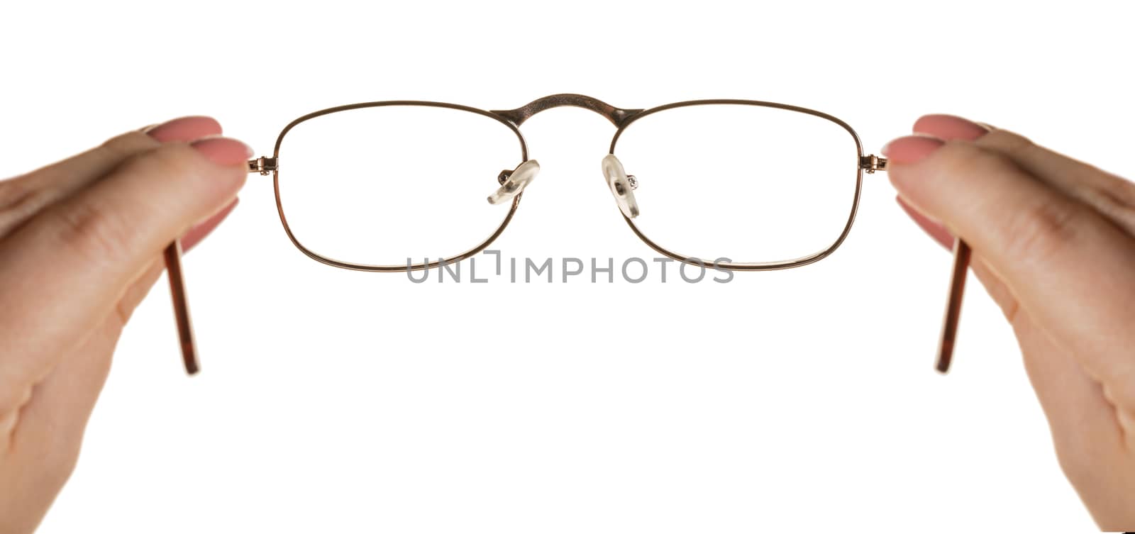 glasses in hand on a white background isolated