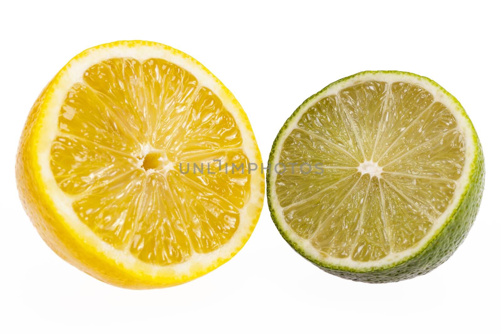 Half a lemon and lime isolated on white background .