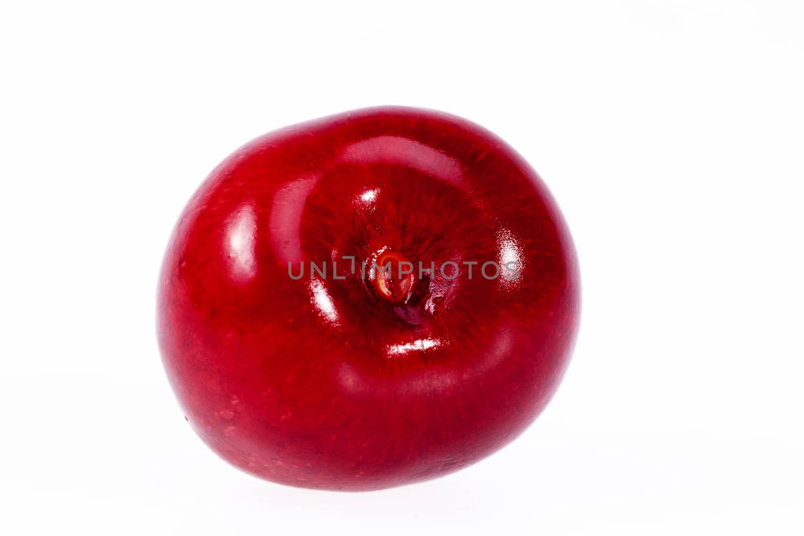 single fruit of red cherry isolated on white background , close up
