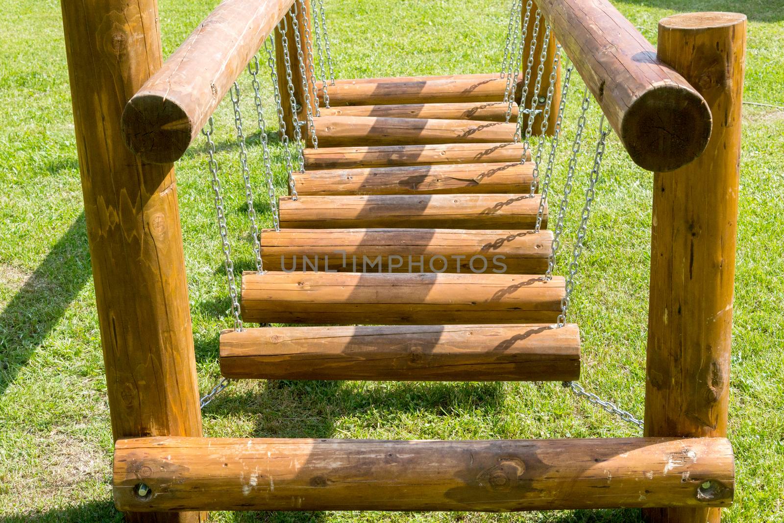 childrens bridge made of logs and chains by vlaru