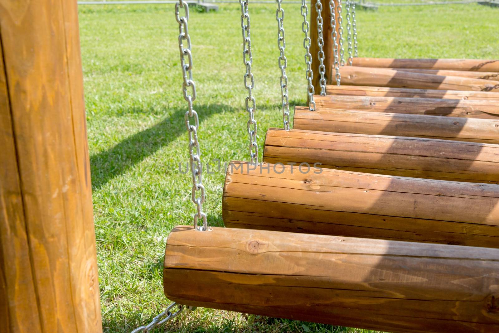 the childrens bridge made of logs and chains