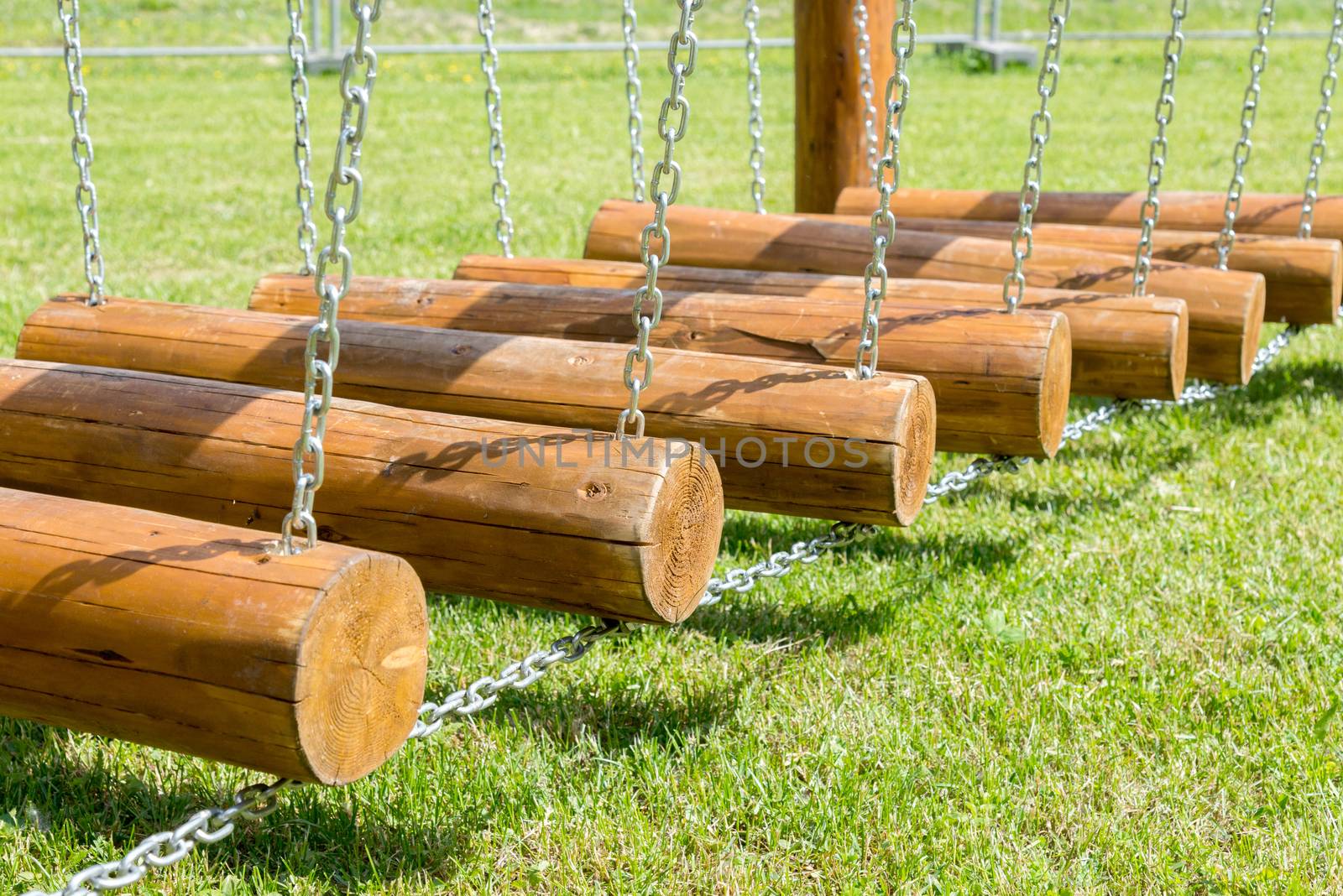 the childrens bridge made of logs and chains