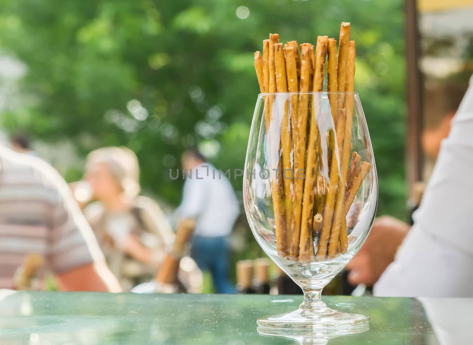 the bread sticks with sesame in a glass