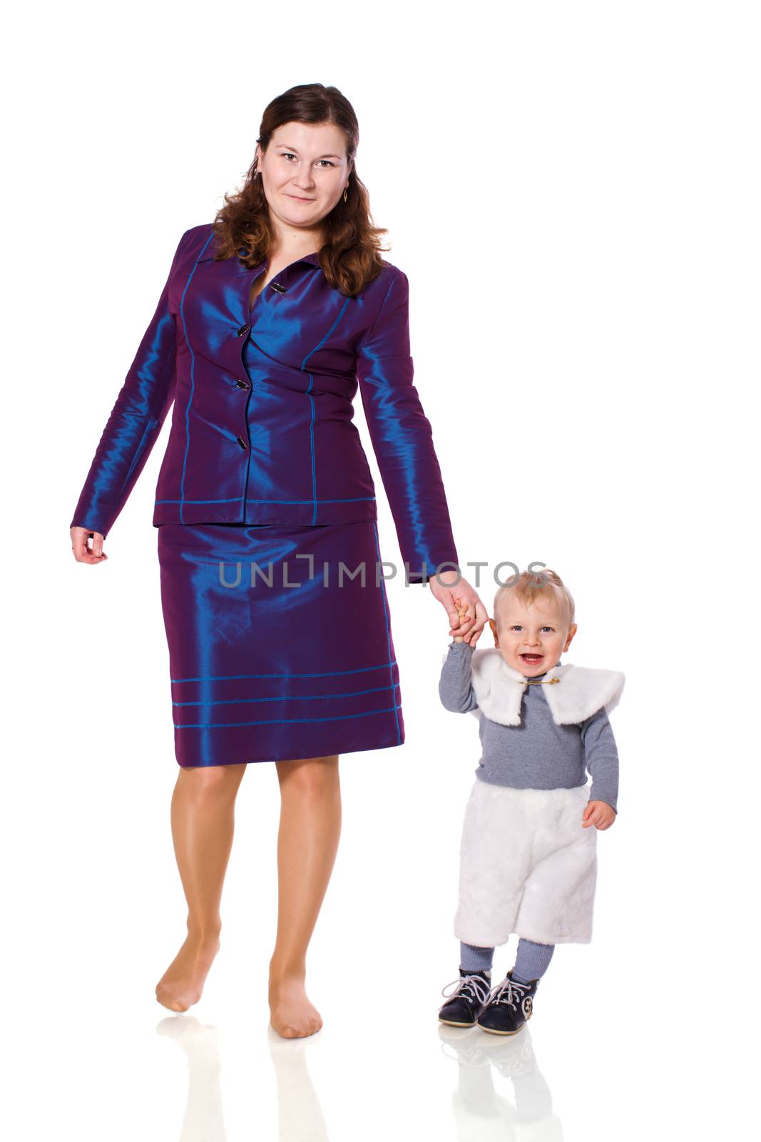 Mother holding little son walking together isolated