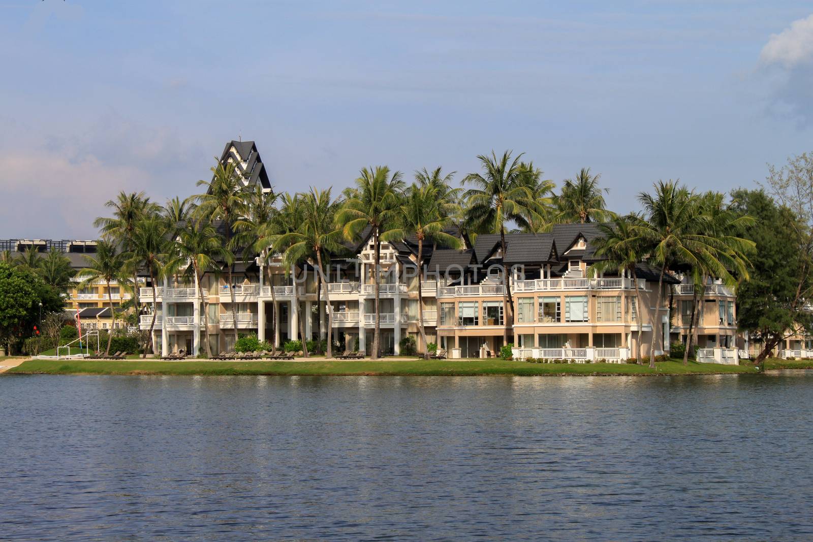Laguna Beach Resort,PHUKET, THAILAND - NOV, 06, 2013: Luxury villa with lagoon lake and palm around by evolutionnow