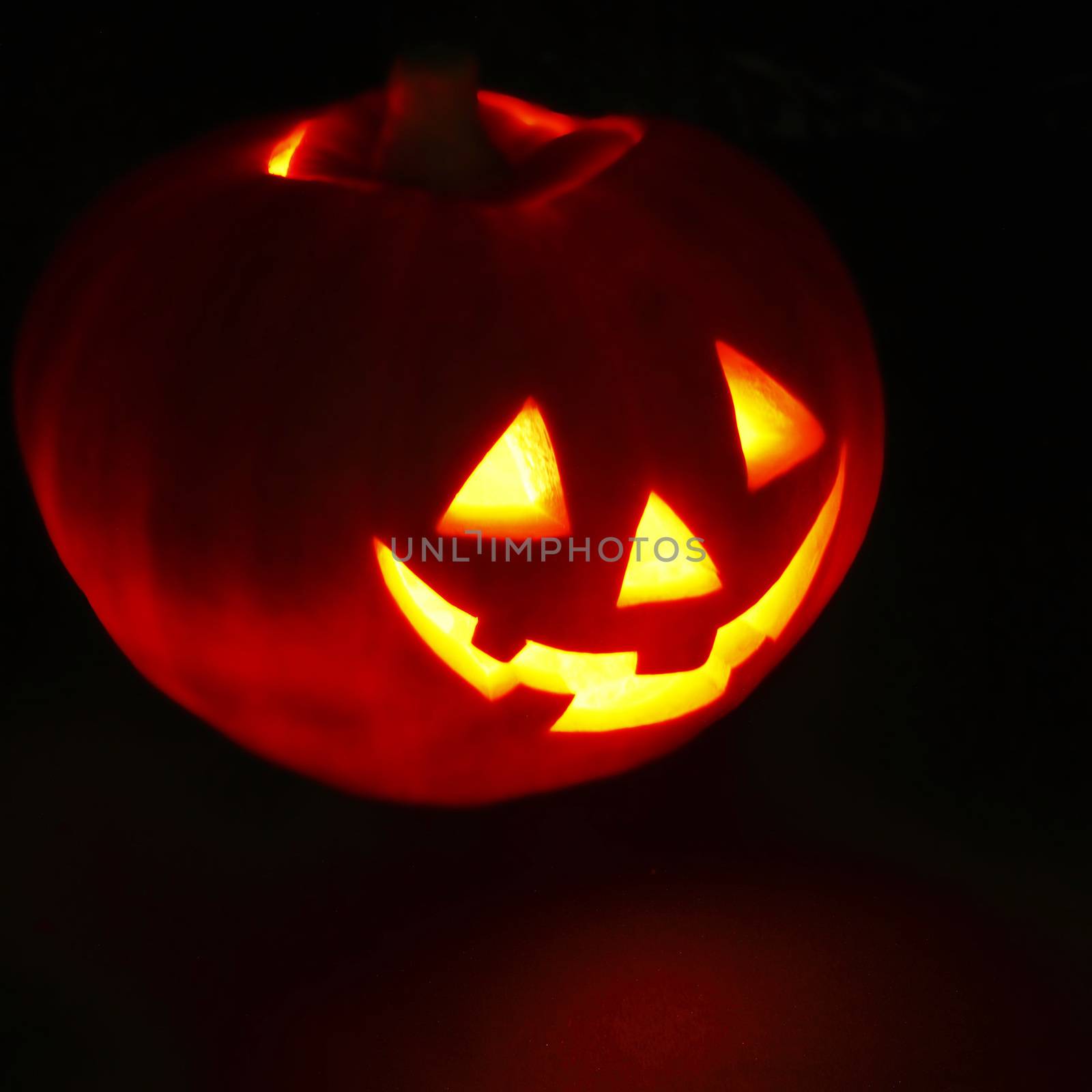 Halloween pumpkin on black by Yellowj