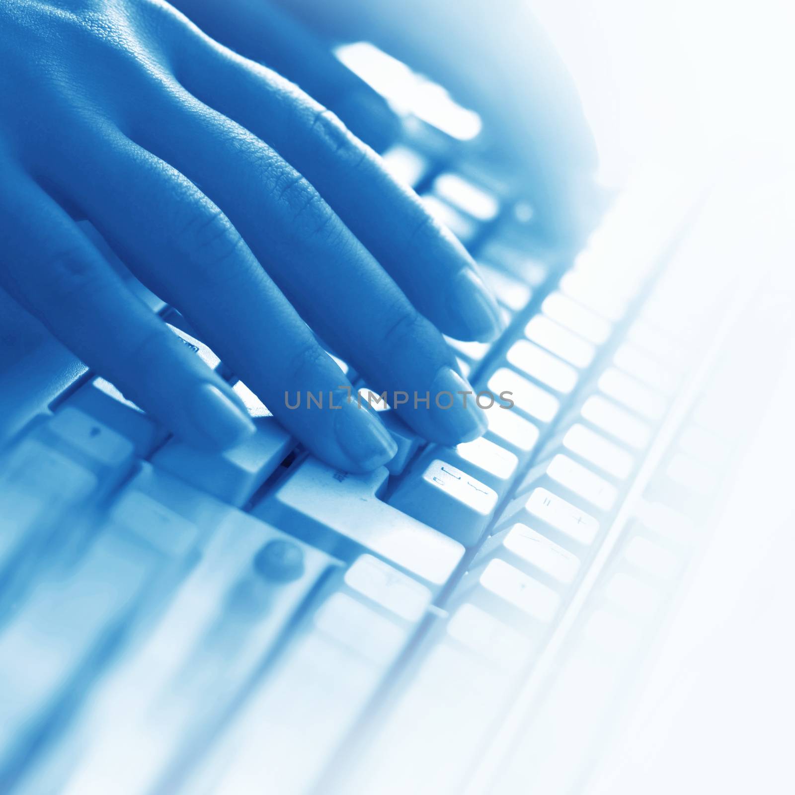 Fingers texting on computer keyboard by Yellowj