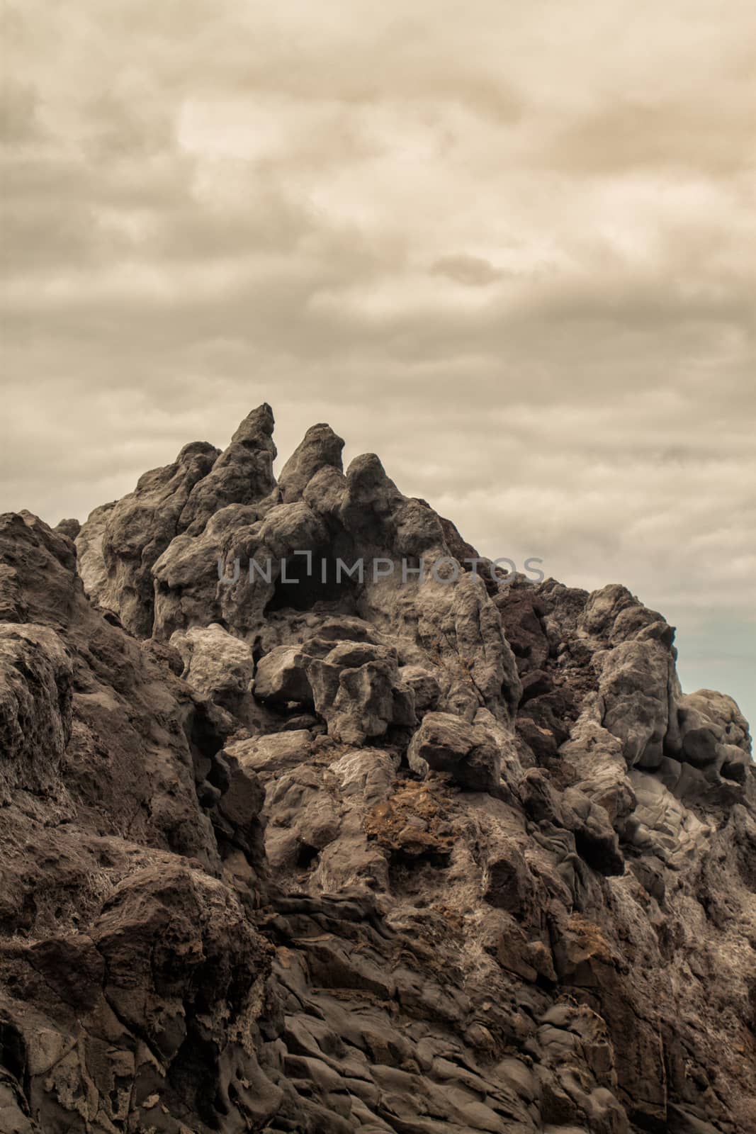 volcanic cliffs on cloud day