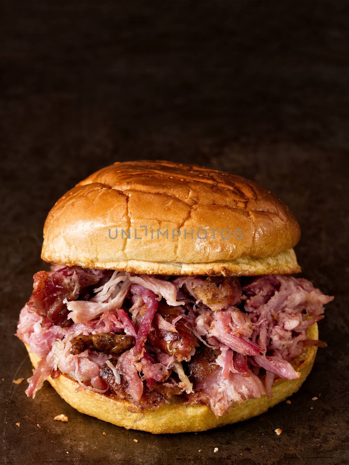 close up of rustic american pulled pork sandwich