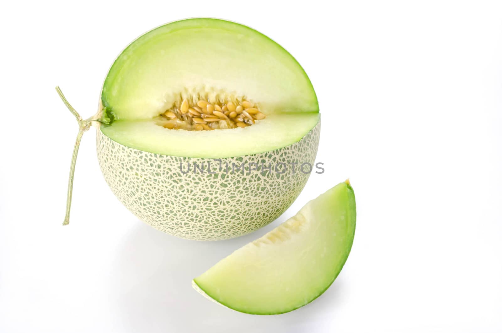 shopped green melon isolated on white background