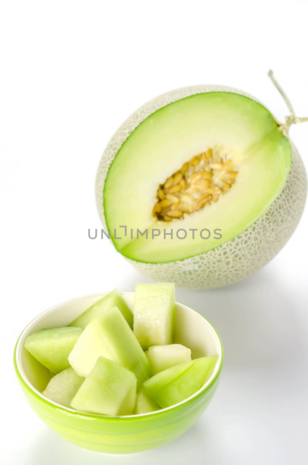 green melon on white  by rakratchada