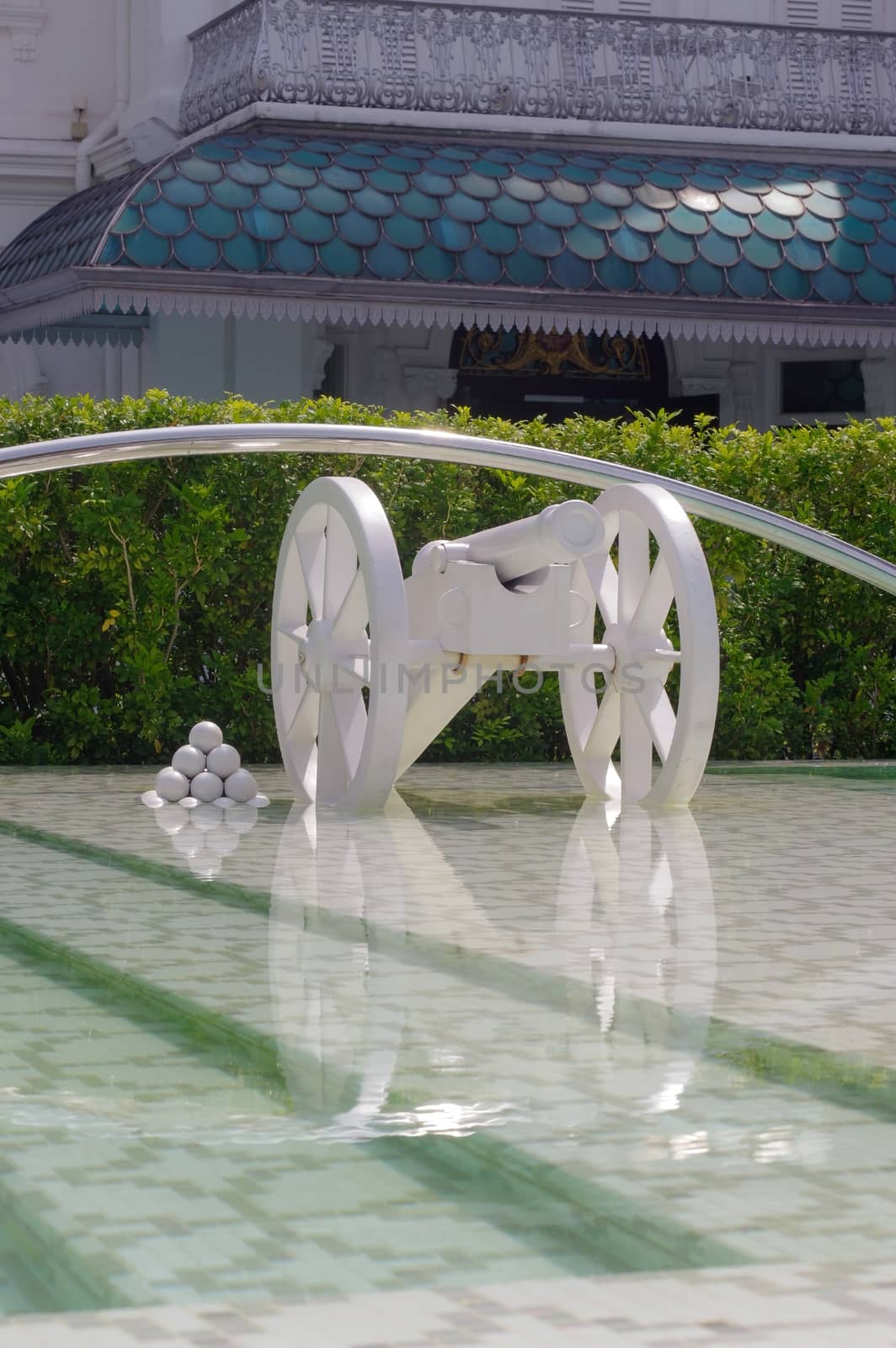 Georgtown, Penang, Malaysia - APRIL 18, 2016: a symbolic white cannon by evolutionnow