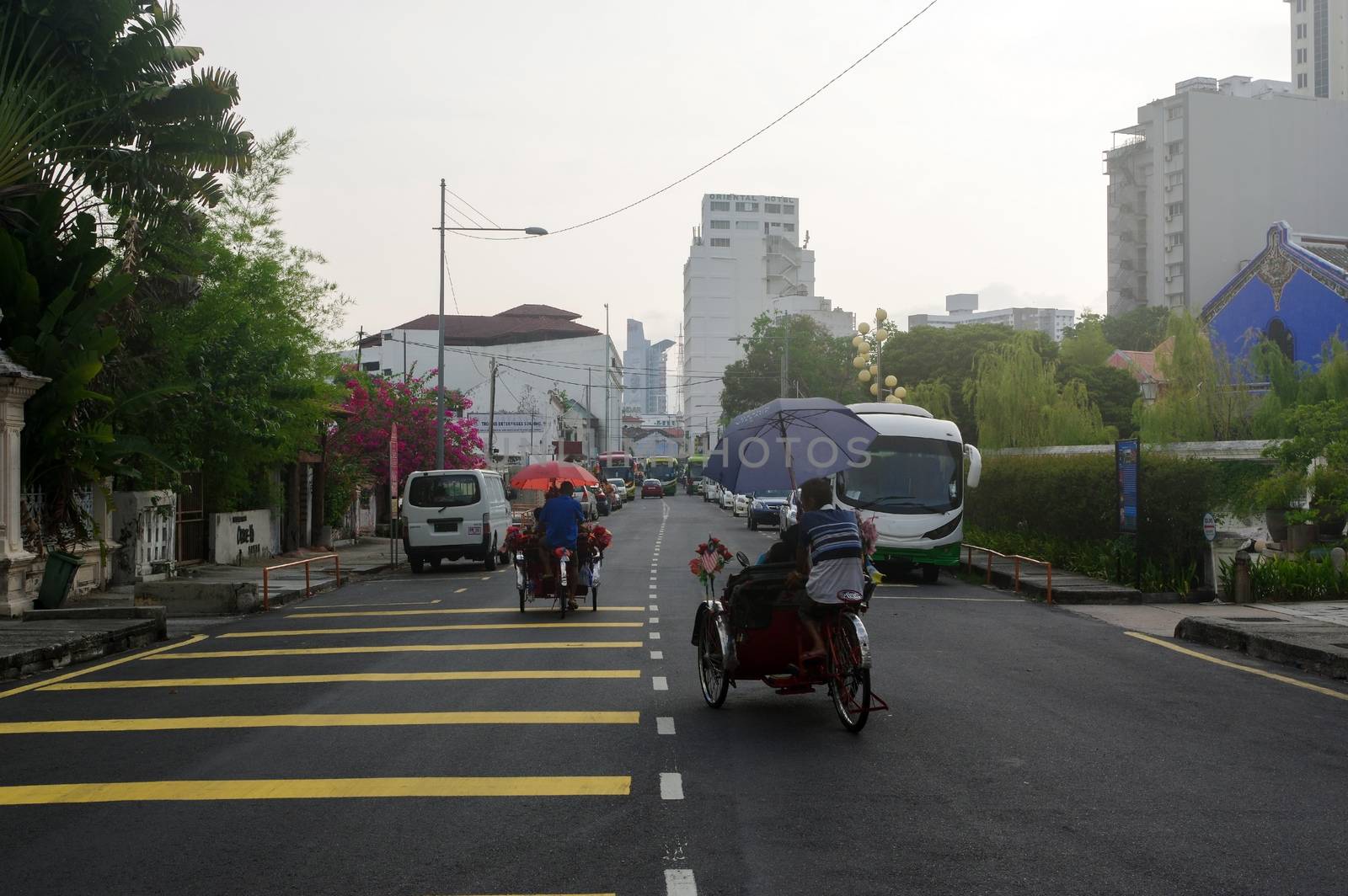 Georgetown, Penang, Malaysia - April 18, 2015: Classic local rickshaw in George Town, Penang in Malaysia