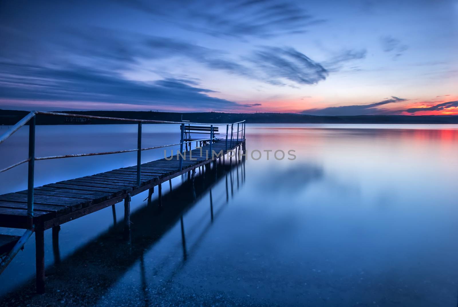 Blue hour. Stunning long exposure sunset on the lake.