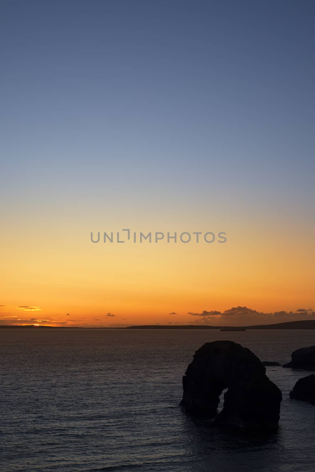 beautiful sunset going down over the virgin rock on the wild atlantic way