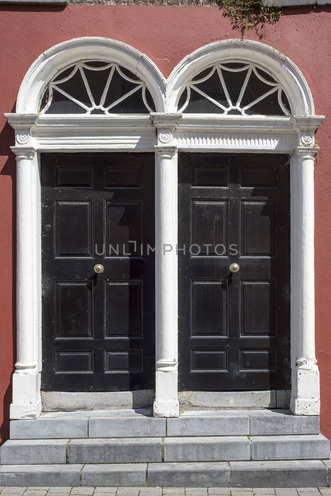 two arched georgian doors in kilkenny city ireland