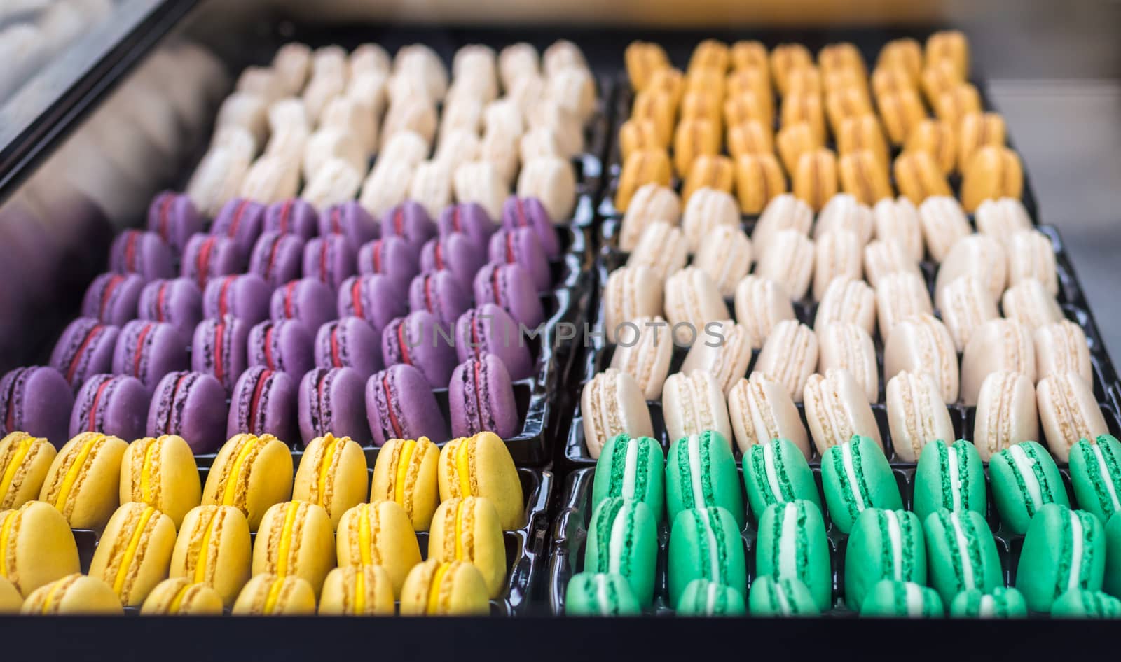 Assorted sweet colourful macaroons. French dessert macaron