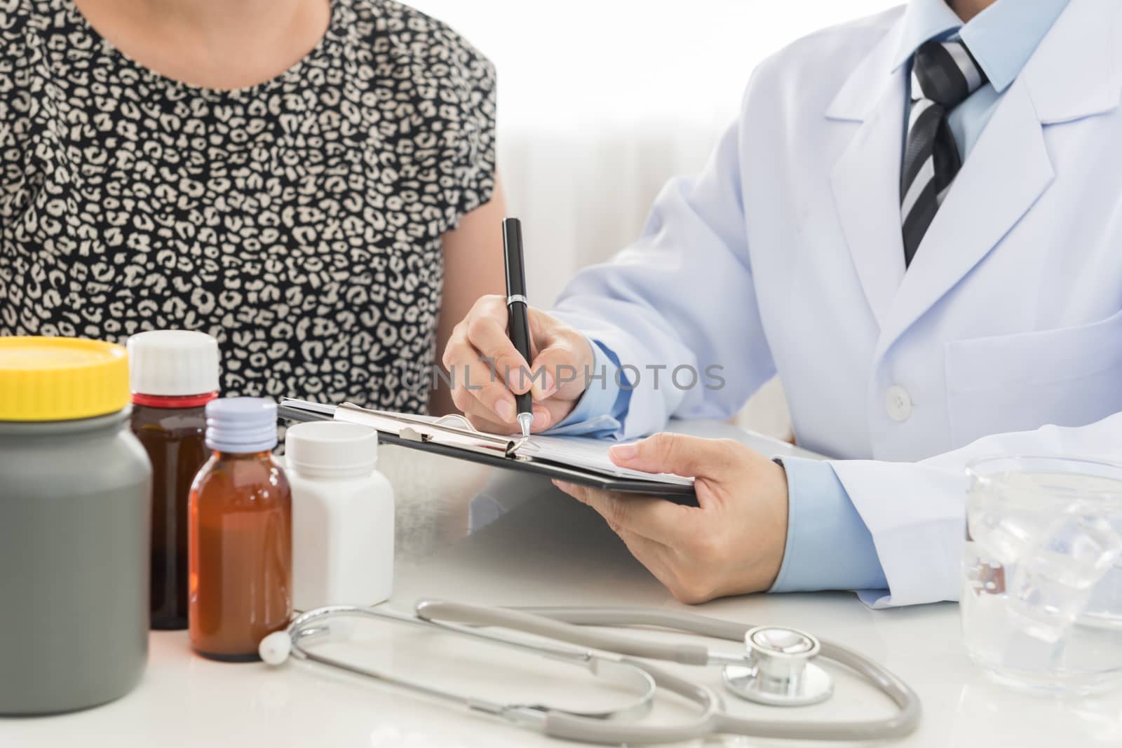 Doctors are recording information the patient's illness.